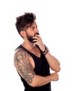 Thoughtful handsome man with tattoos Royalty Free Stock Photo