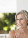 Thoughtful Happy Middle Aged Woman Looking Away Royalty Free Stock Photo