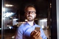 Businessman in the office at night working late. Royalty Free Stock Photo