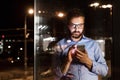 Businessman in the office at night working late. Royalty Free Stock Photo