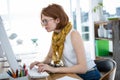 thoughtful hipster businesswoman concentrating on her computer Royalty Free Stock Photo