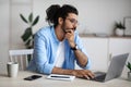 Thoughtful Indian Freelancer Working With Laptop At Home Office, Looking At Screen Royalty Free Stock Photo