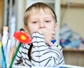 Thoughtful laft handed boy Royalty Free Stock Photo