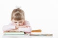 Thoughtful little girl with a books