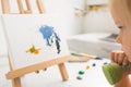 Thoughtful little painter in art studio Royalty Free Stock Photo