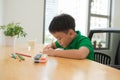 Thoughtful little student studying in the morning Royalty Free Stock Photo