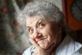 Thoughtful and looking elderly woman face Royalty Free Stock Photo