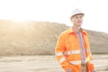 Thoughtful male supervisor looking away at construction site Royalty Free Stock Photo