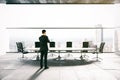 Thoughtful man in conference room Royalty Free Stock Photo