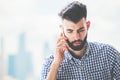 Thoughtful man on phone Royalty Free Stock Photo