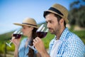 Thoughtful man smelling red wine in glass Royalty Free Stock Photo