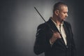 thoughtful man in suit with katana sword Royalty Free Stock Photo