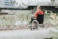 thoughtful man in a wheelchair