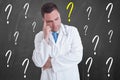 Thoughtful medic trying to solve a medical problem Royalty Free Stock Photo