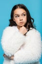 thoughtful preteen girl in white faux Royalty Free Stock Photo