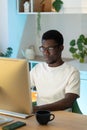 Thoughtful web developer work on computer, programmer trying to find solution for bug in app code Royalty Free Stock Photo