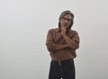 Thoughtful senior businessman in red casual shirt Royalty Free Stock Photo