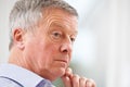 Thoughtful Senior Man At Home Royalty Free Stock Photo