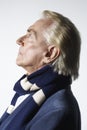 Thoughtful Senior Man Wearing Scarf Royalty Free Stock Photo