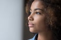 Thoughtful serious African American teen girl face portrait Royalty Free Stock Photo