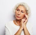 Thoughtful serious senior woman feeling blue worried about problems Royalty Free Stock Photo