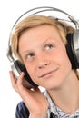 Thoughtful teenage boy listening to music Royalty Free Stock Photo