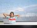 Thoughtful Teenage Boy Sitting In Classroom Royalty Free Stock Photo