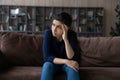 Thoughtful unhappy Indian woman lost in thoughts, looking to aside Royalty Free Stock Photo