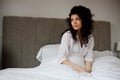 Thoughtful woman in bed Royalty Free Stock Photo