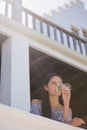 Thoughtful woman drinking white wine in restaurant Royalty Free Stock Photo