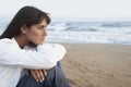 Thoughtful Woman Looking Away At Beach Royalty Free Stock Photo