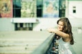 Thoughtful woman near fence Royalty Free Stock Photo