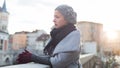 Thoughtful woman outdoors on cold winter day. Royalty Free Stock Photo