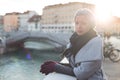 Thoughtful woman outdoors on cold winter day. Royalty Free Stock Photo