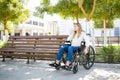 Thoughtful woman using a wheelchair Royalty Free Stock Photo