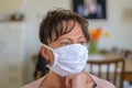 Thoughtful worried woman wearing a face mask Royalty Free Stock Photo
