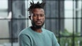 Thoughtful young black man looking straight ahead Royalty Free Stock Photo