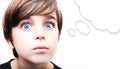 Thoughtful young boy with an empty thought bubble Royalty Free Stock Photo