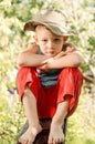 Thoughtful young boy staring at the camera Royalty Free Stock Photo