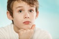 Thoughtful young boy watching intently Royalty Free Stock Photo