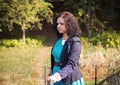 Thoughtful beautiful girl standing on bridge Royalty Free Stock Photo