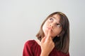 Thoughtful young girl looking up Royalty Free Stock Photo