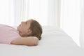 Thoughtful Young Girl Lying In Bed Royalty Free Stock Photo