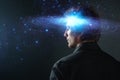 Thoughtful young man, creative mind concept. A man with a galaxy in his head, Royalty Free Stock Photo