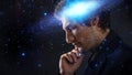 Thoughtful young man, creative mind concept. A man with a galaxy in his head, Royalty Free Stock Photo