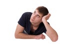 Thoughtful young man lying Royalty Free Stock Photo