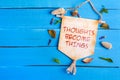 Thoughts become things text on Paper Scroll
