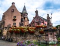 The church of Eguisheim in Alsace, France, with a thousand years of history and the square with the statue of Pope Leon IX natural