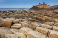 Thousands of tourists visiting Giant`s Causeway in County Antrim of Northern Ireland