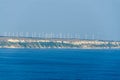 Thracian cliffs near blue clear water of Black Sea, wind farm Royalty Free Stock Photo